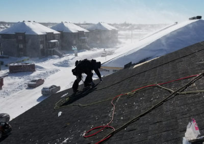 Déneigement de toiture à Oka - Toitures Mathieu Gravel à St-Joseph-du-Lac